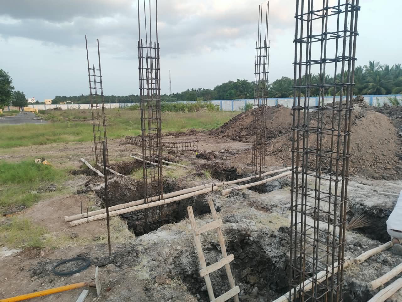 TN Build Coimbatore construction site — reinforcement columns under progress